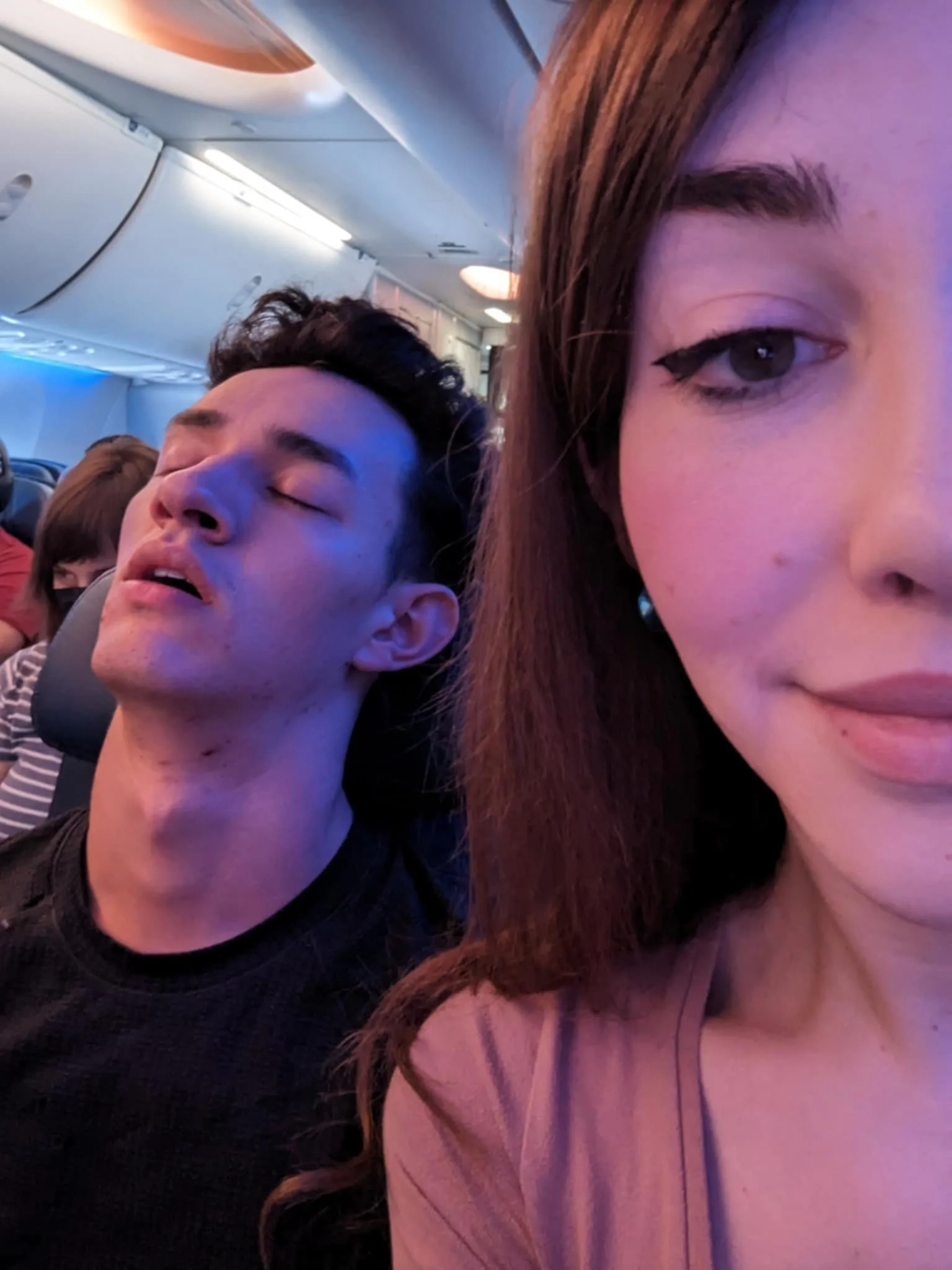 Aubrey and Alexander on a flight