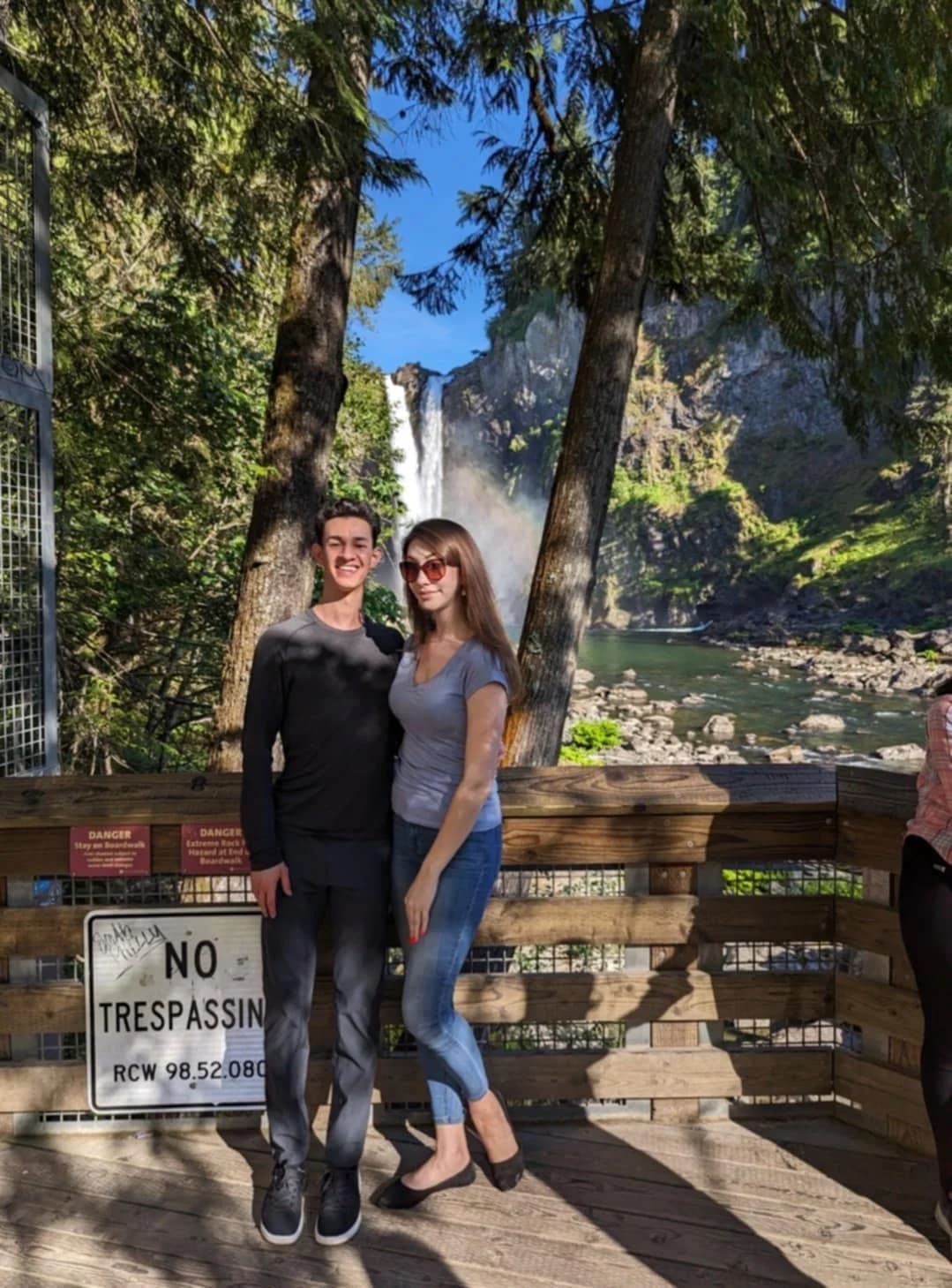 Alexander and Aubrey at a waterfall